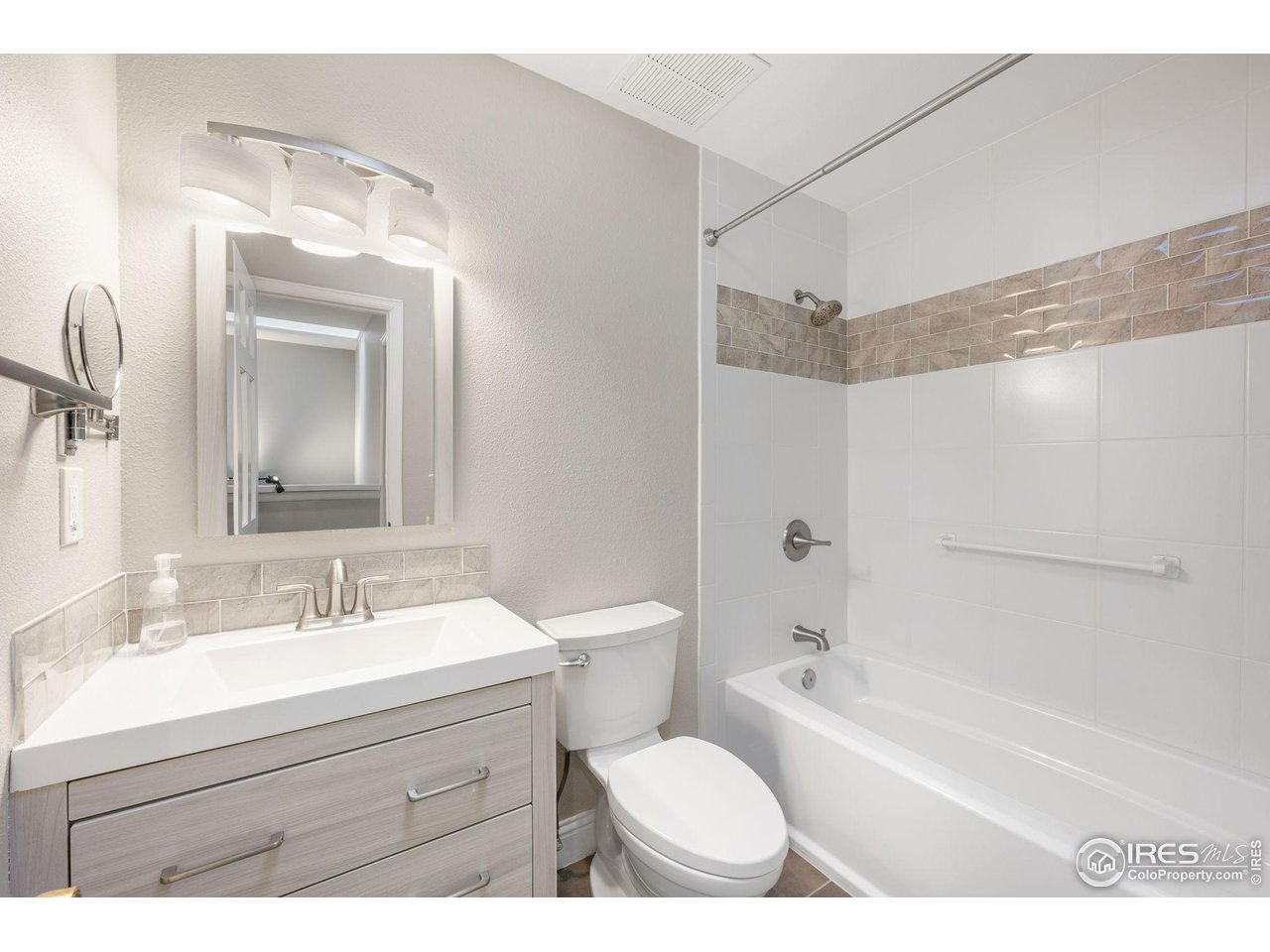 3074 Edison Court Boulder, CO 80301 - Photo 26 of 37 Updated full bath with solar tube