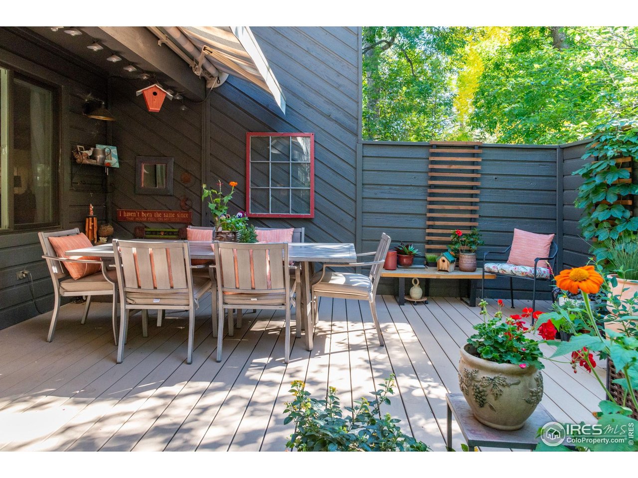 3074 Edison Court Boulder, CO 80301 - Photo 28 of 37 Enjoy outdoor living on the oversized high-end Trex deck with motorized awning