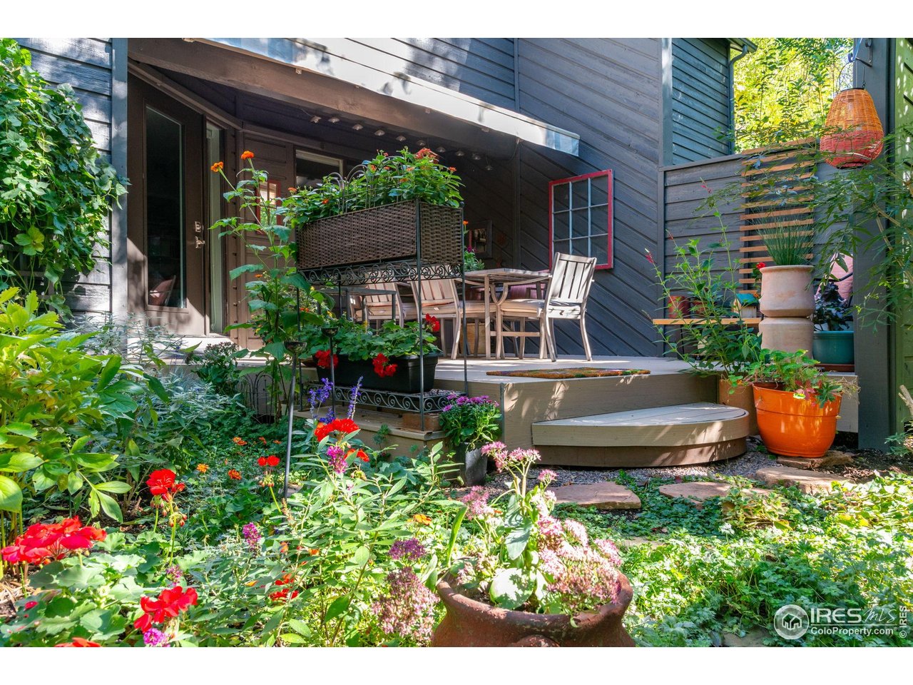 3074 Edison Court Boulder, CO 80301 - Photo 30 of 37 Stunning back yard area filled with perennials