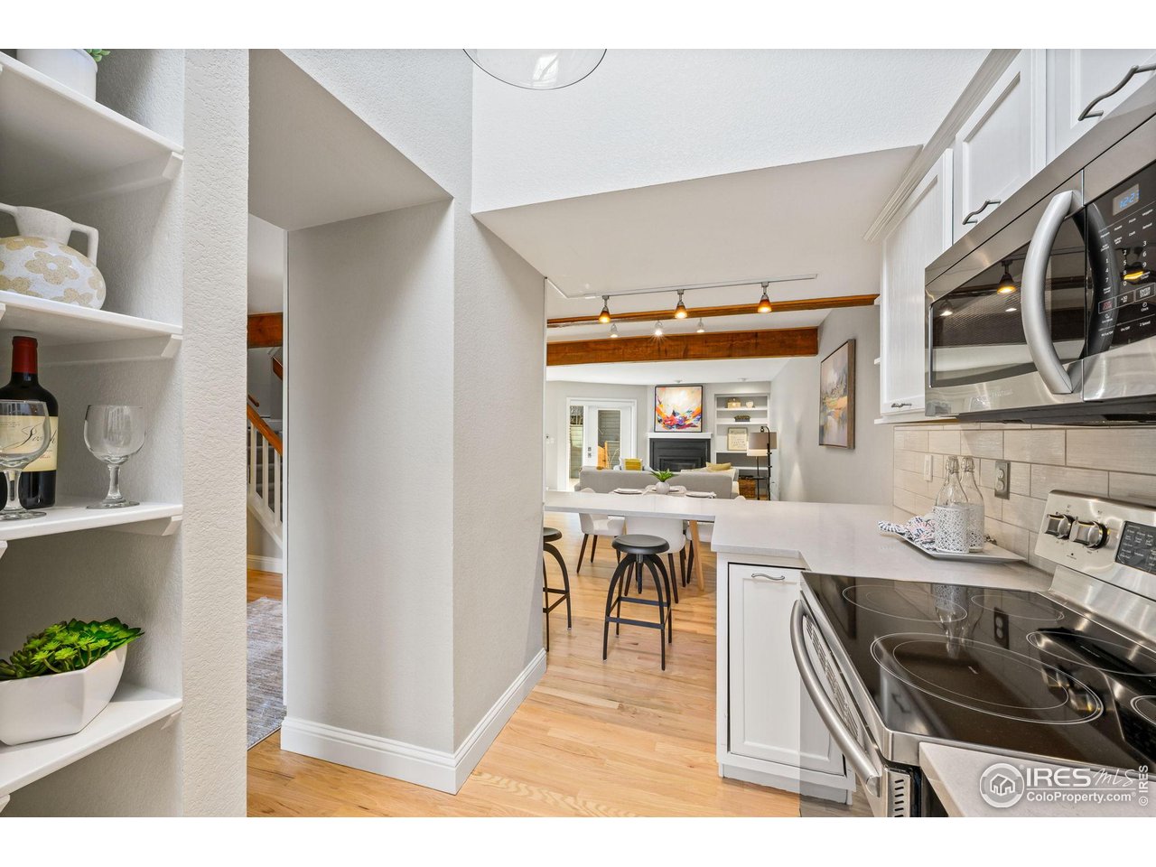 3074 Edison Court Boulder, CO 80301 - Photo 5 of 37 Newly updated kitchen with quartz counters & stylish backsplash