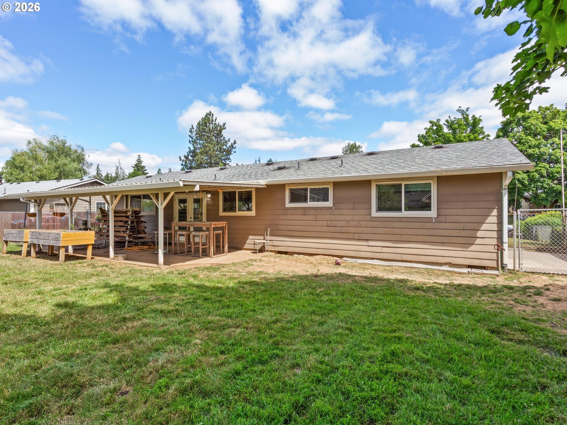 1719 Southwest 1st Street Battle Ground, WA 98604 - Photo 31 of 37 a view of a house with a backyard