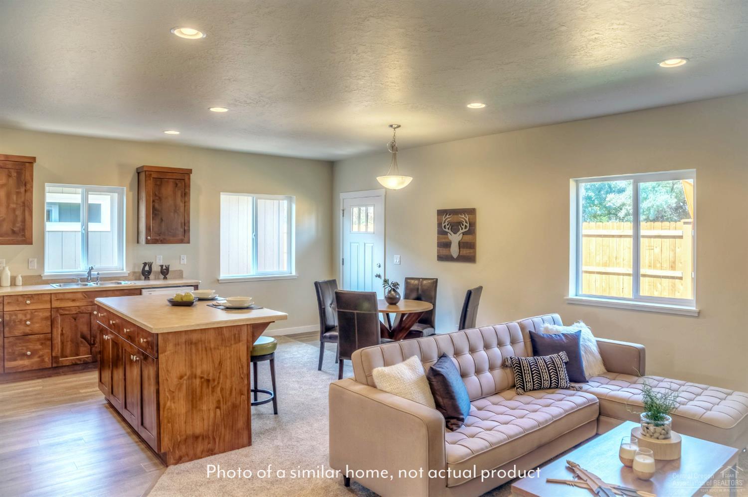 2547 Northeast Apollo Road Prineville, OR 97754 - Photo 3 of 9 a living room with furniture a table and a window