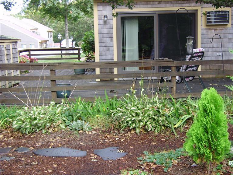 37 Roundhouse Road, Unit 37 Buzzards Bay, MA 02532 - Photo 3 of 12 a view of a chair and table in the garden