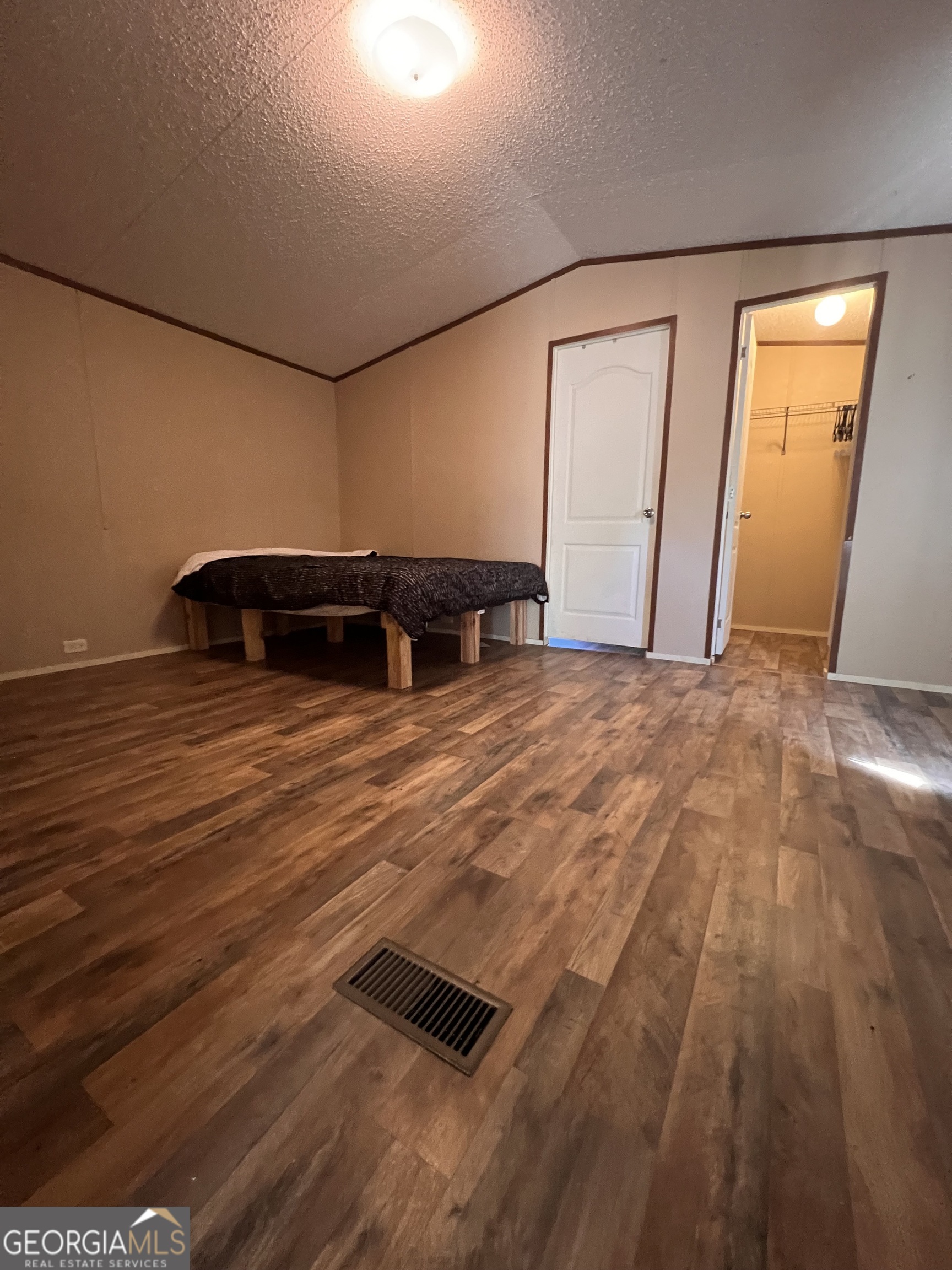 113 Riverview Soperton, GA 30457 - Photo 9 of 16 a view of empty room with wooden floor