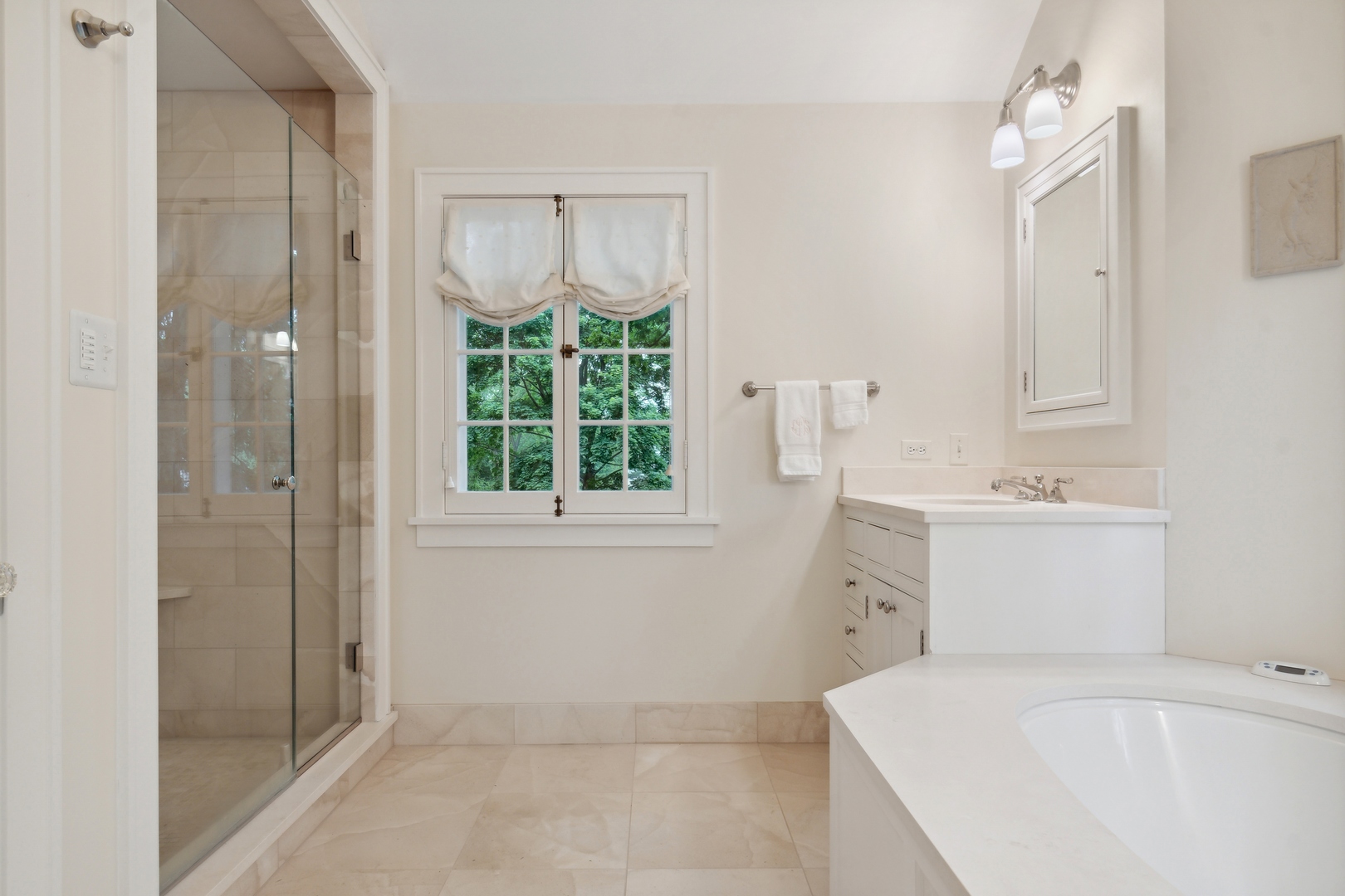 460 Washington Road Lake Forest, IL 60045 - Photo 26 of 50 a bathroom with a sink a vanity and a mirror