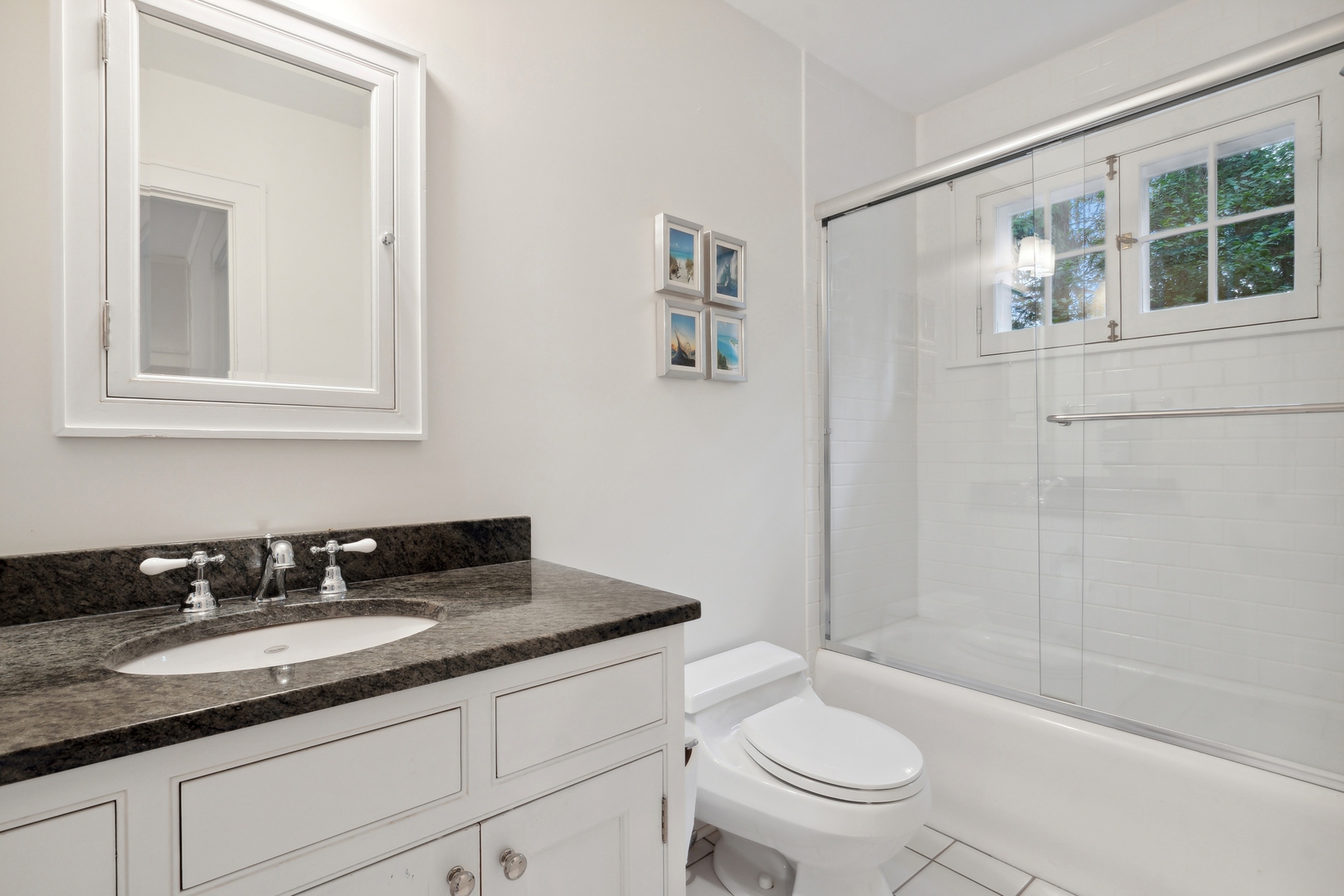 460 Washington Road Lake Forest, IL 60045 - Photo 29 of 50 a bathroom with a granite countertop sink toilet and shower