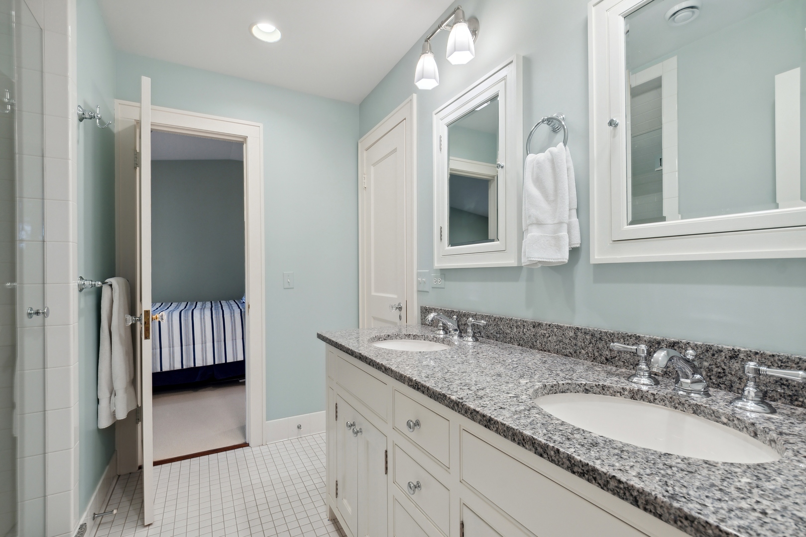 460 Washington Road Lake Forest, IL 60045 - Photo 34 of 50 a bathroom with a granite countertop double vanity sink and a mirror