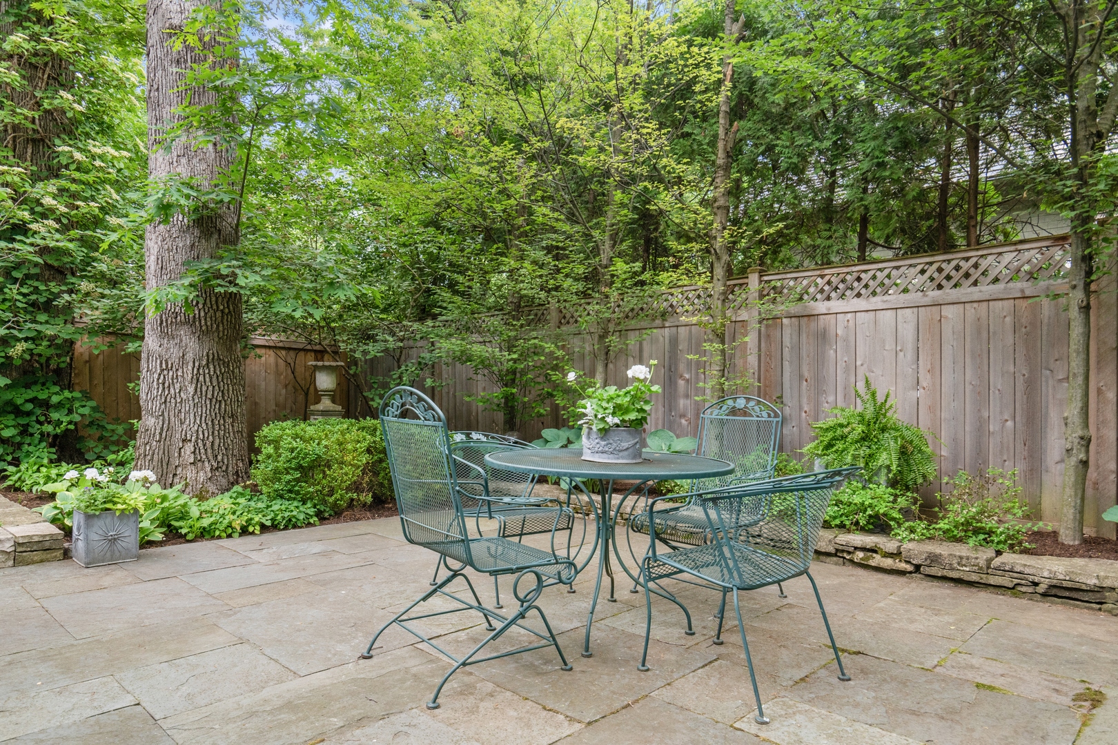 460 Washington Road Lake Forest, IL 60045 - Photo 45 of 50 a patio with yard table and chairs