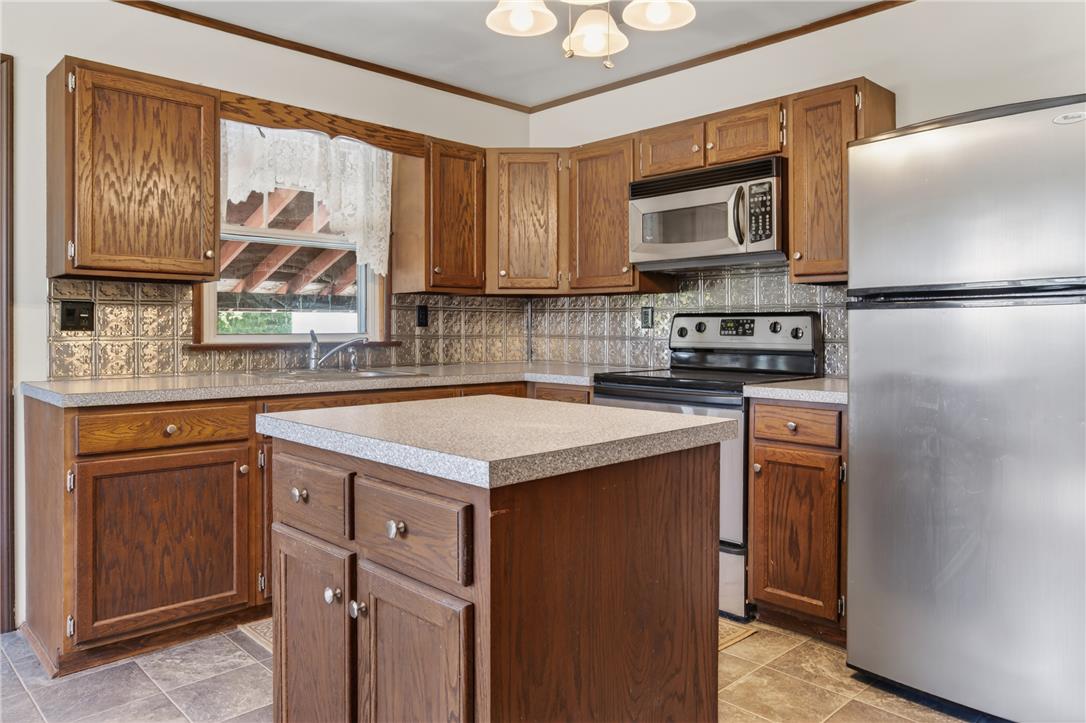 62 Stoney Road Tamaqua, PA 18252 - Photo 17 of 61 A well-appointed culinary space featuring ample cabinetry and a practical central island.