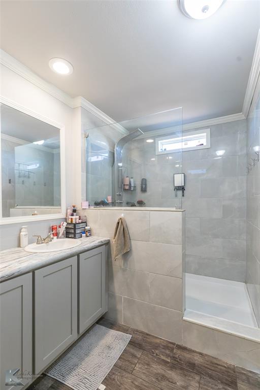 11682 County Road 434 Merkel, TX 79536 - Photo 12 of 37 a bathroom with a double vanity sink mirror and shower