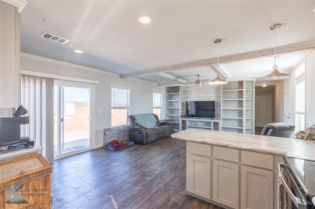 11682 County Road 434 Merkel, TX 79536 - Photo 19 of 37 a living room with furniture and a flat screen tv