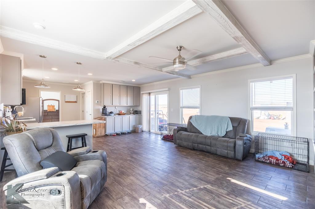 11682 County Road 434 Merkel, TX 79536 - Photo 23 of 37 a living room with furniture and a wooden floor