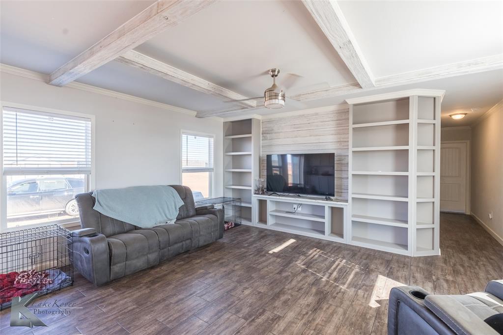 11682 County Road 434 Merkel, TX 79536 - Photo 25 of 37 a living room with furniture flat screen tv and window