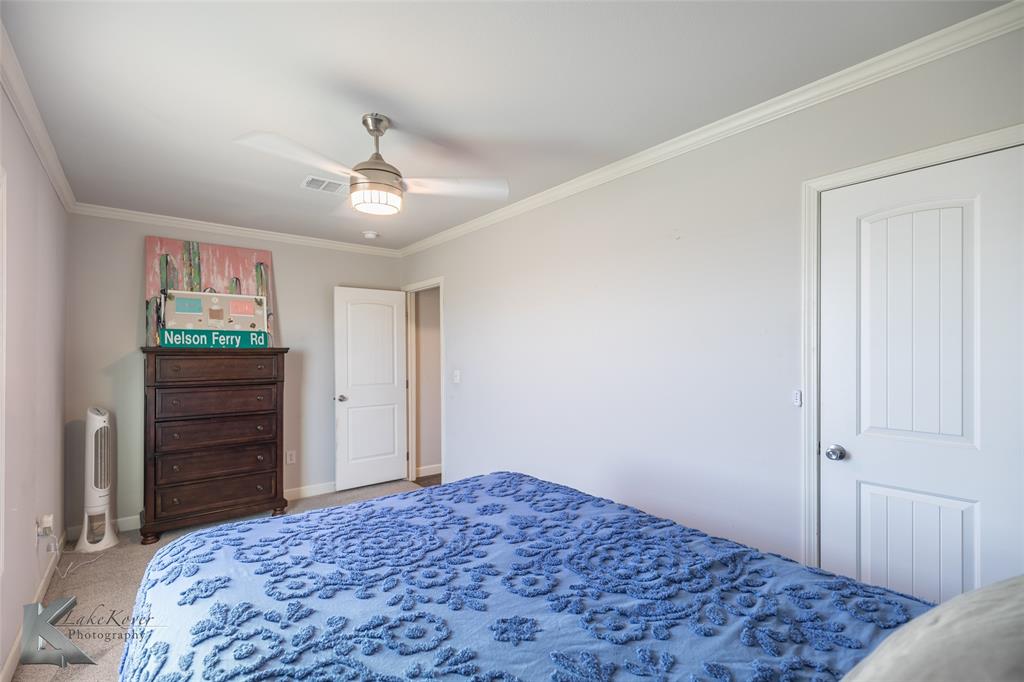 11682 County Road 434 Merkel, TX 79536 - Photo 6 of 37 a bedroom with a bed and a dresser