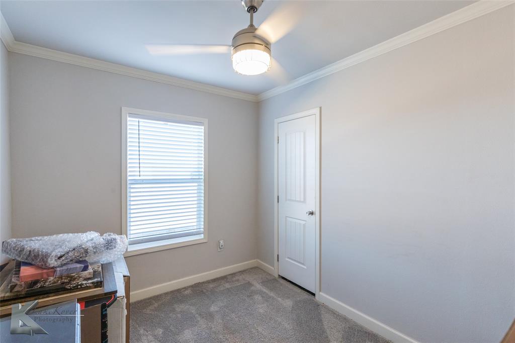 11682 County Road 434 Merkel, TX 79536 - Photo 9 of 37 a view of room with hardwood floor and window
