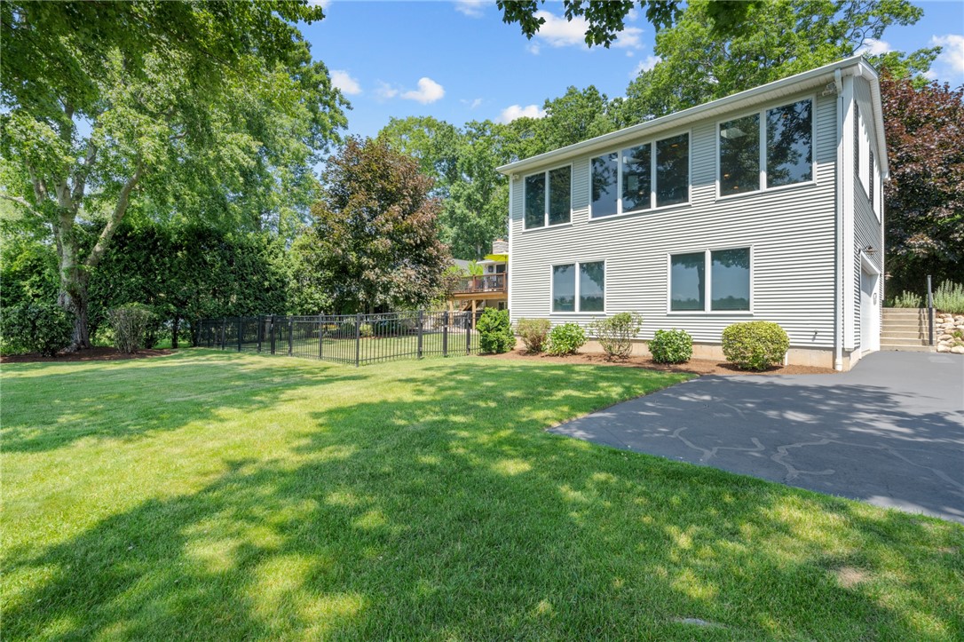31 Sharon Drive Coventry, RI 02816 - Photo 7 of 49 Vinyl siding and Anderson windows ensure years of low maintenance living.