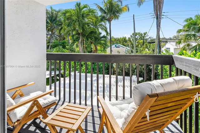 a view of a two chairs in the roof deck