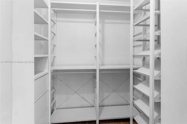 a view of an empty walk in closet
