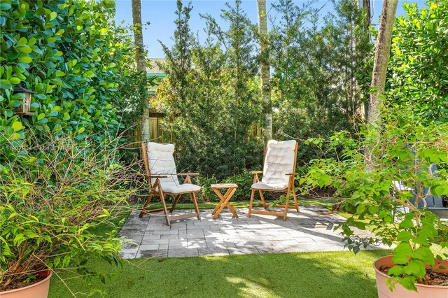 a view of a bench in a garden