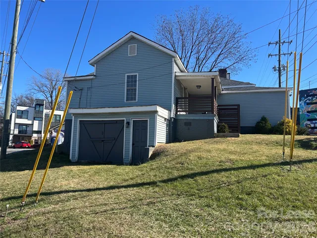 a house view with a backyard space