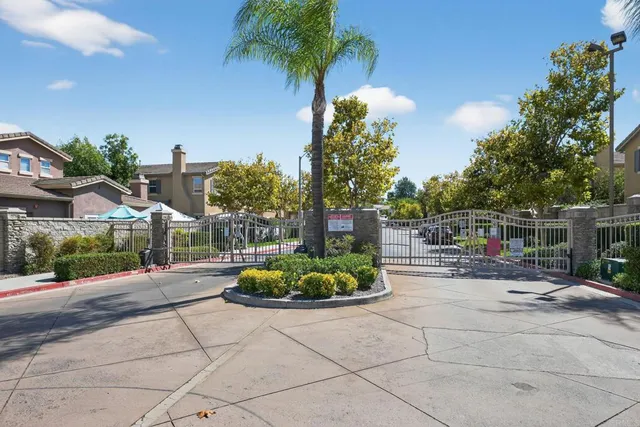 a view of a backyard with sitting area and entertaining space