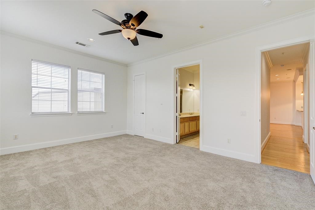 7134 Mapleridge Street, Unit 3B Houston, TX 77081 - Photo 18 of 26 an empty room with closet and windows