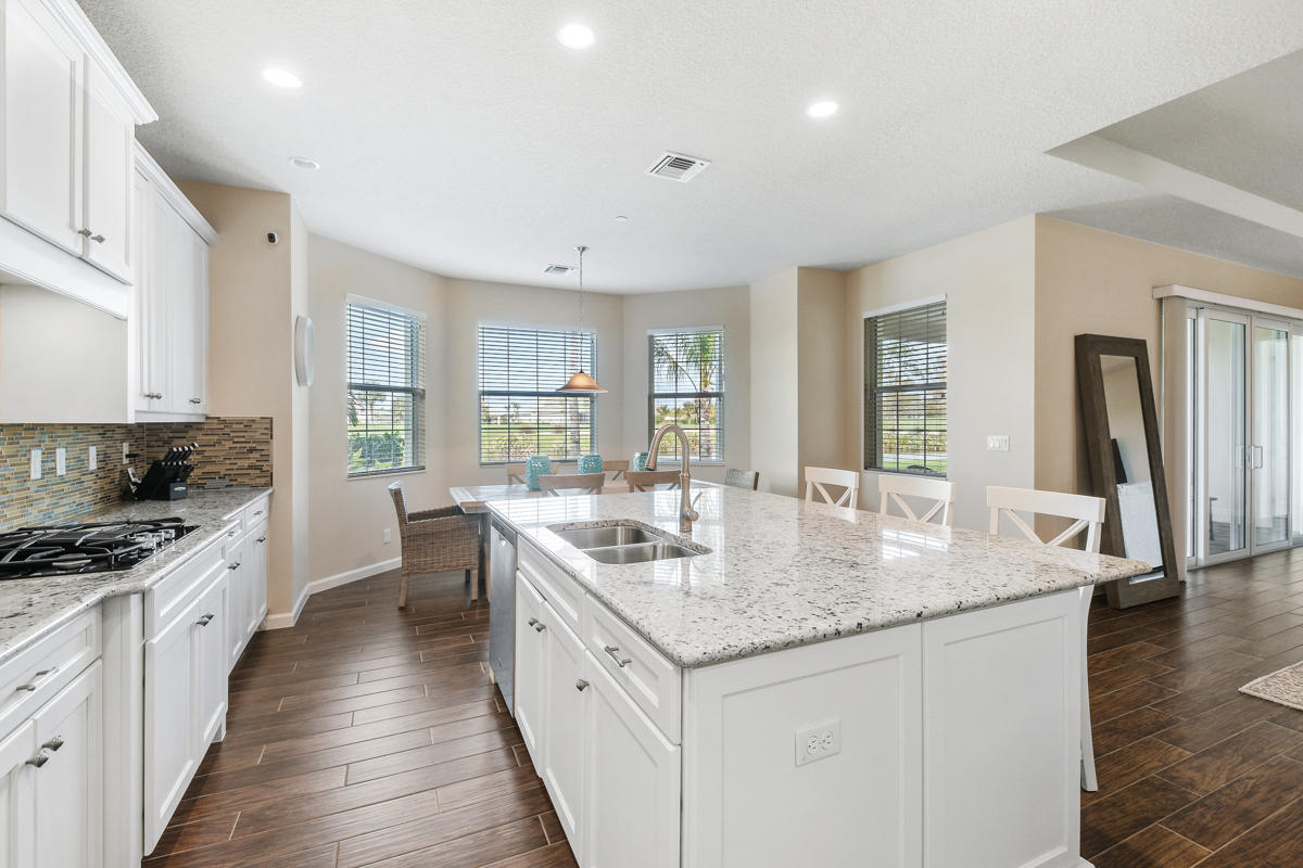 159 Tresana Boulevard, Unit 113 Jupiter, FL 33478 - Photo 12 of 64 Open Modern Kitchen