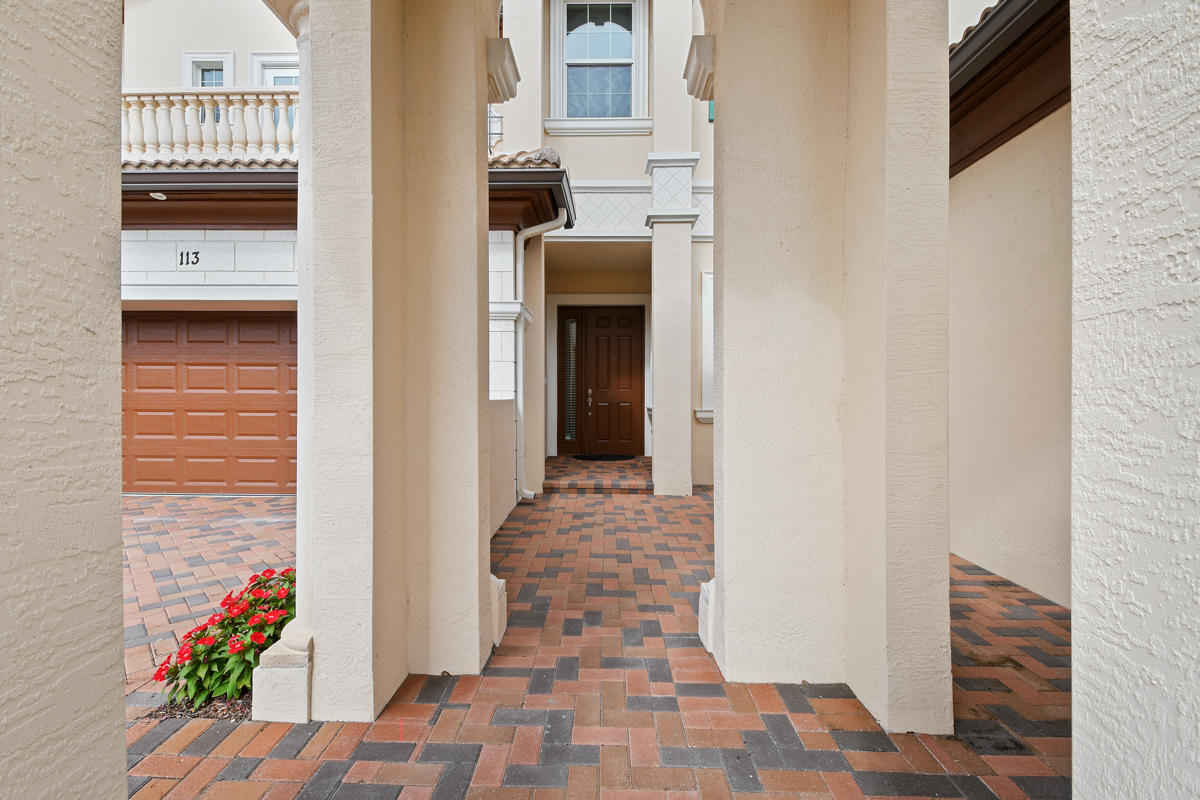 159 Tresana Boulevard, Unit 113 Jupiter, FL 33478 - Photo 5 of 64 Courtyard Entryway