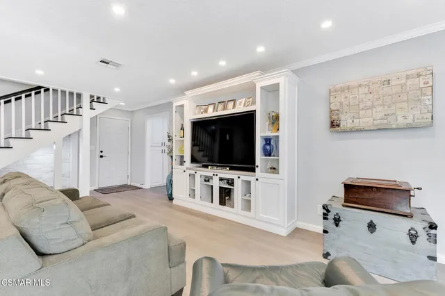 a dining room with furniture window wooden floor