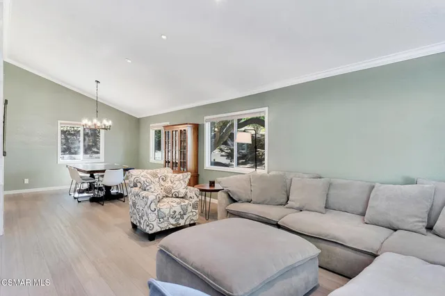 a bathroom with double sink and a mirror