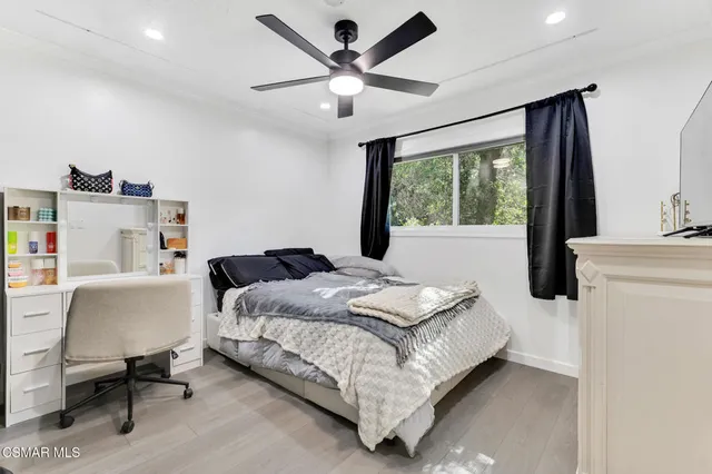 a bathroom with a shower and a glass door