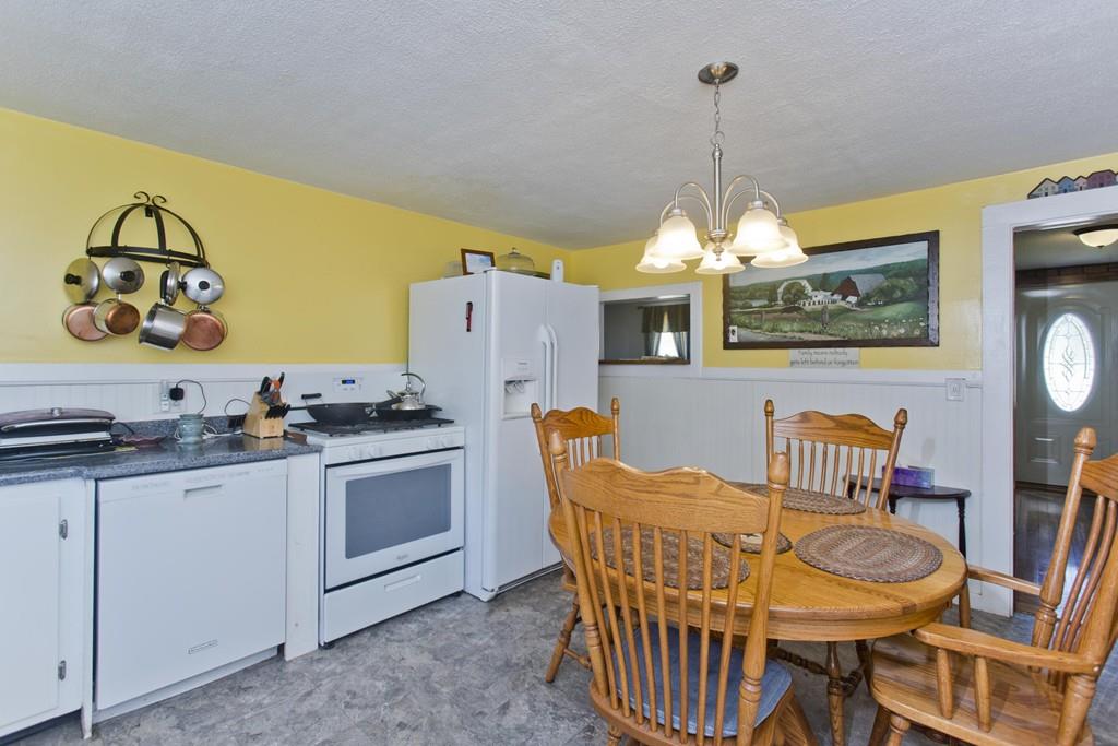 401 Palmer Road Ware, MA 01082 - Photo 16 of 34 a view of a dining room with furniture window and wooden floor