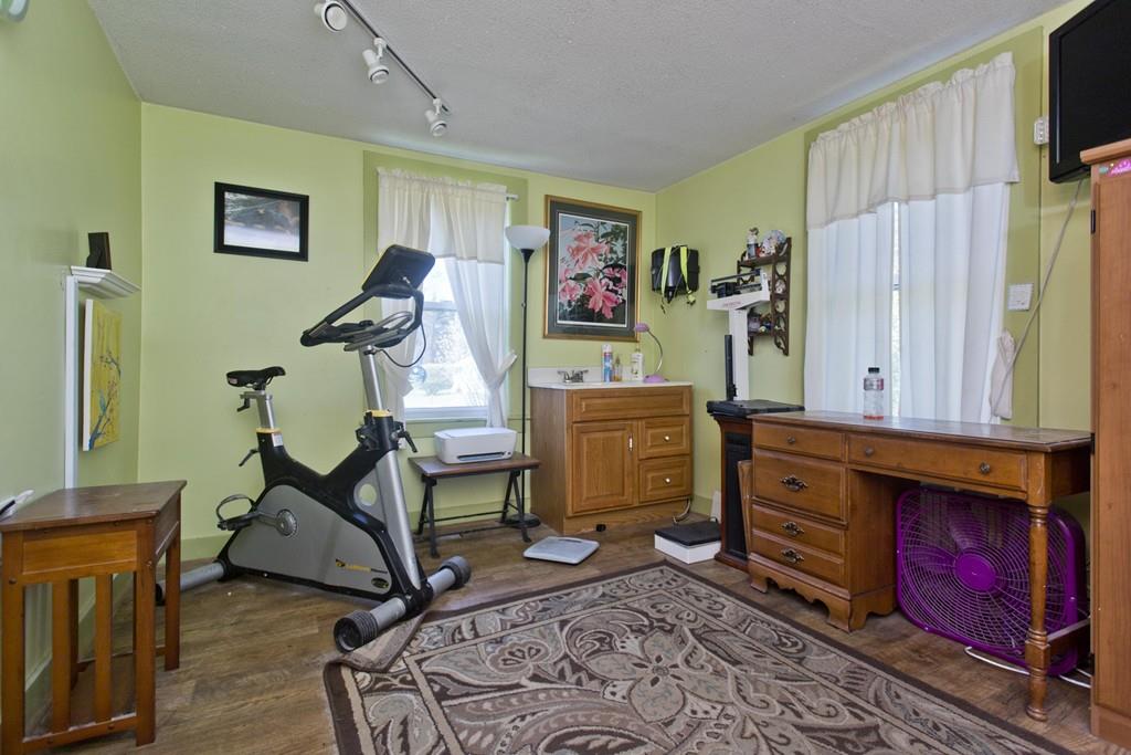 401 Palmer Road Ware, MA 01082 - Photo 19 of 34 a room with furniture a rug and a window