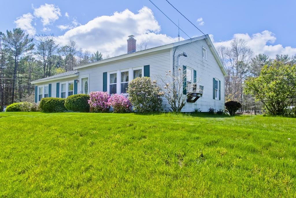 401 Palmer Road Ware, MA 01082 - Photo 2 of 34 a front view of house with garden