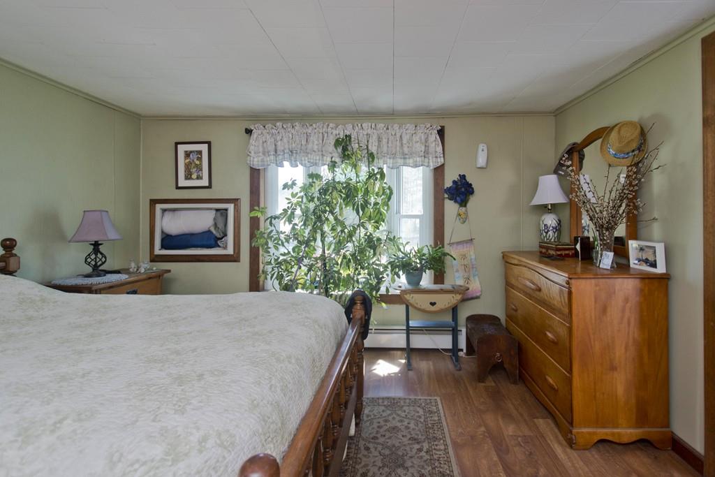 401 Palmer Road Ware, MA 01082 - Photo 26 of 34 a bedroom with furniture and a window