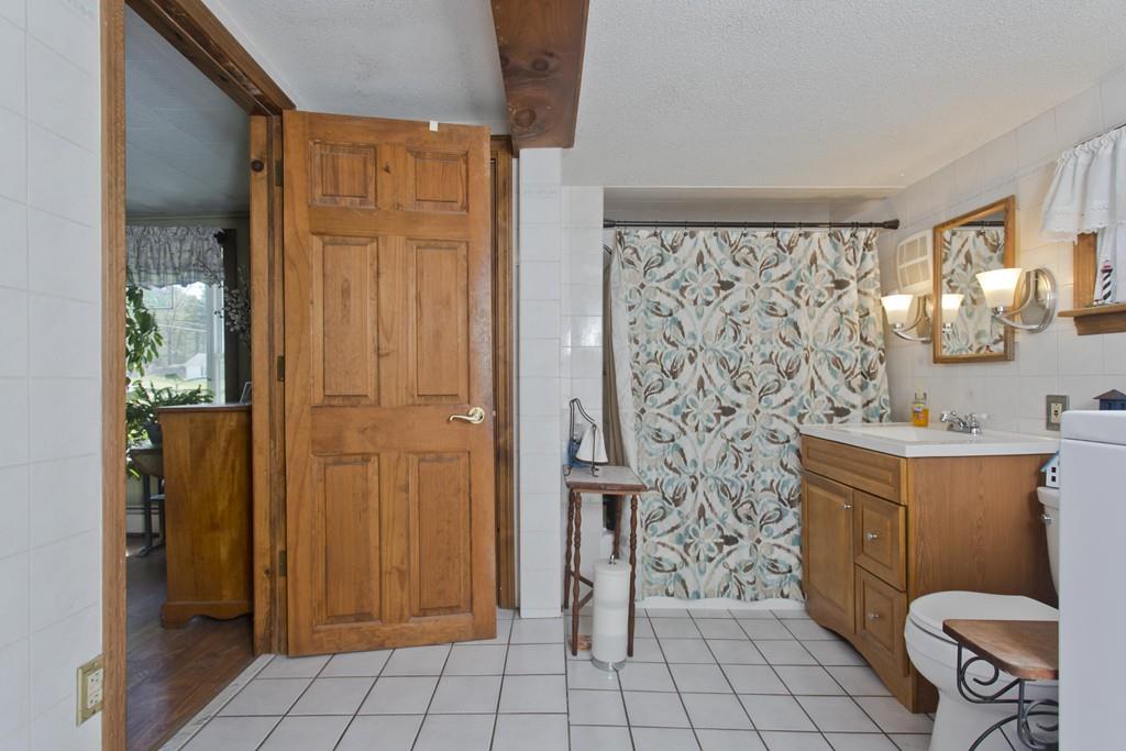 401 Palmer Road Ware, MA 01082 - Photo 28 of 34 a bathroom with a toilet and a shower