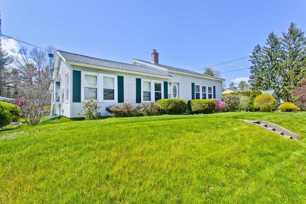 401 Palmer Road Ware, MA 01082 - Photo 3 of 34 a front view of house with yard and green space