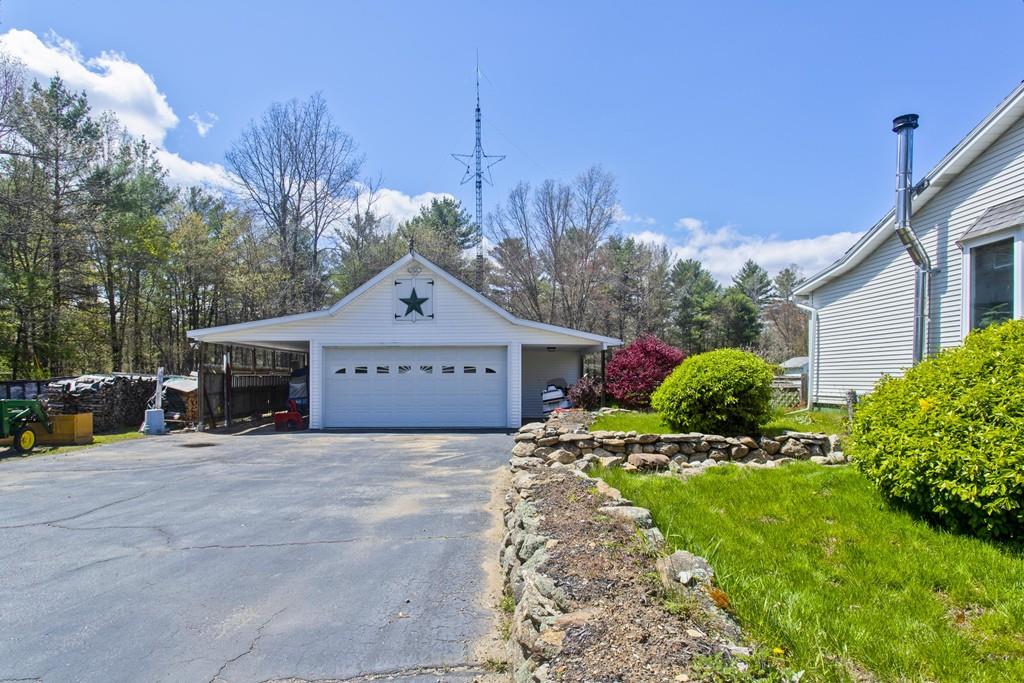 401 Palmer Road Ware, MA 01082 - Photo 7 of 34 a view of a house with a yard and large tree