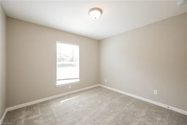 an empty room with a window