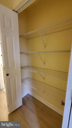 a bathroom with a wooden floor