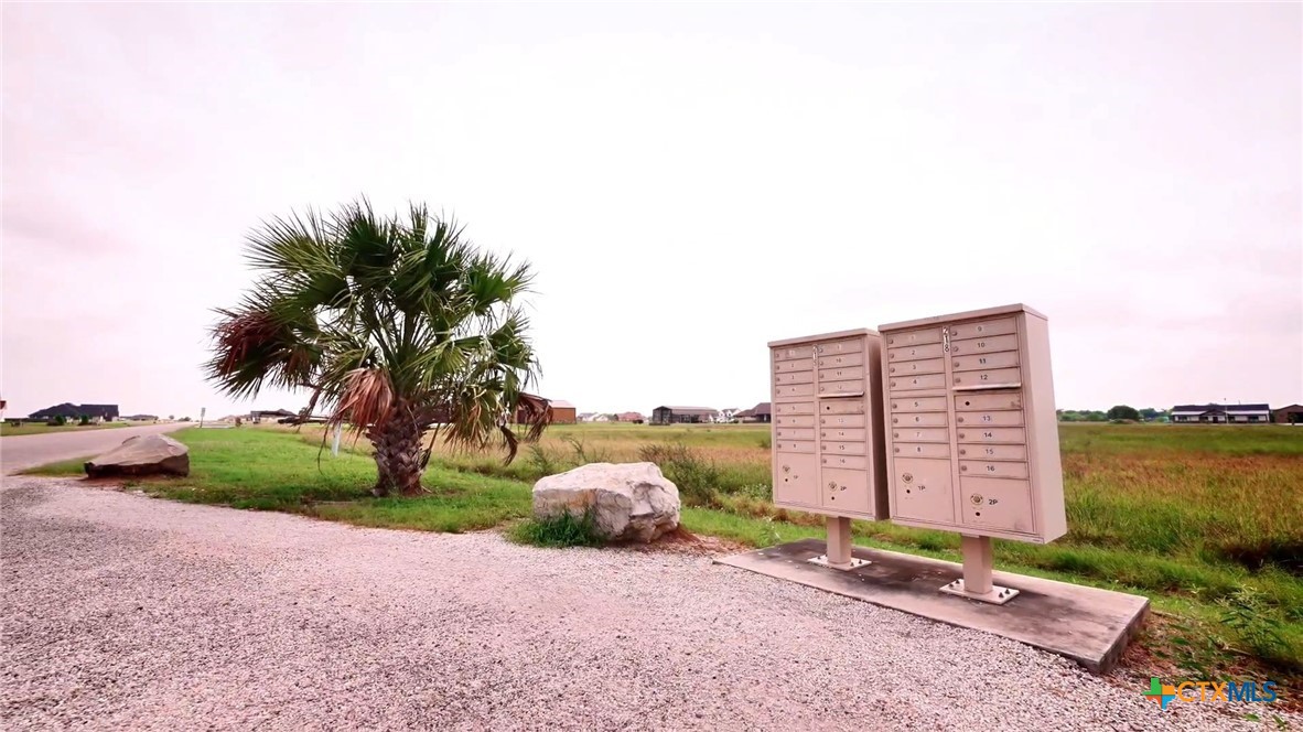 94 Sendera Loop Victoria, TX 77904 - Photo 13 of 18 a view of a large building with a yard