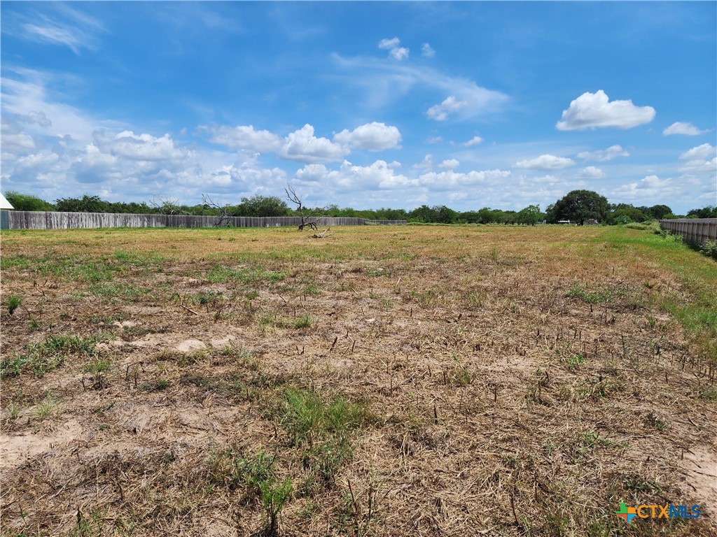 94 Sendera Loop Victoria, TX 77904 - Photo 16 of 18 a view of a lake and sunset