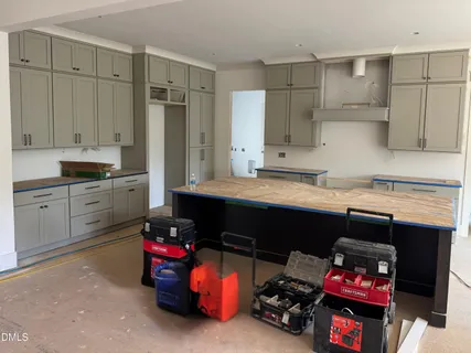 a picture of a bathroom with a shower