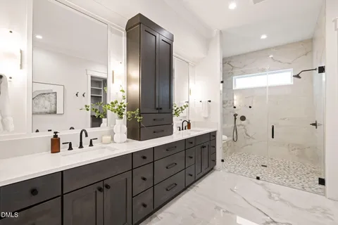 a living room with a large window and outer view