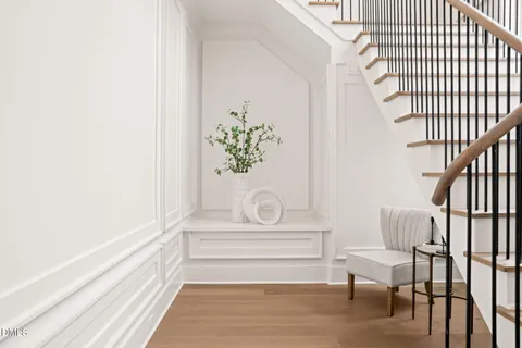 a view of a big room with window and ceiling fan