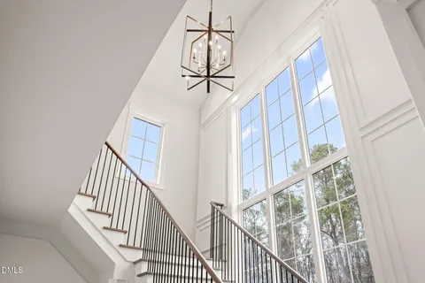 a outdoor living space with furniture and a floor to ceiling window