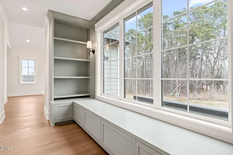 a picture of a bench in front of a building