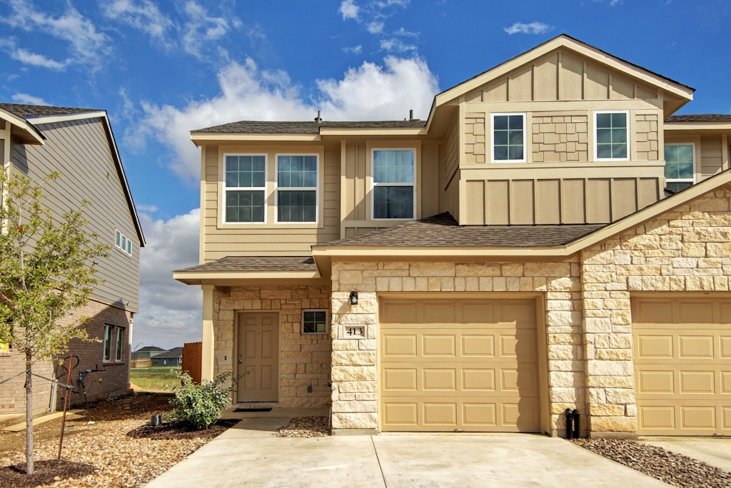 413 White Steppe Way Georgetown, TX 78626 - Photo 2 of 25 a front view of a house