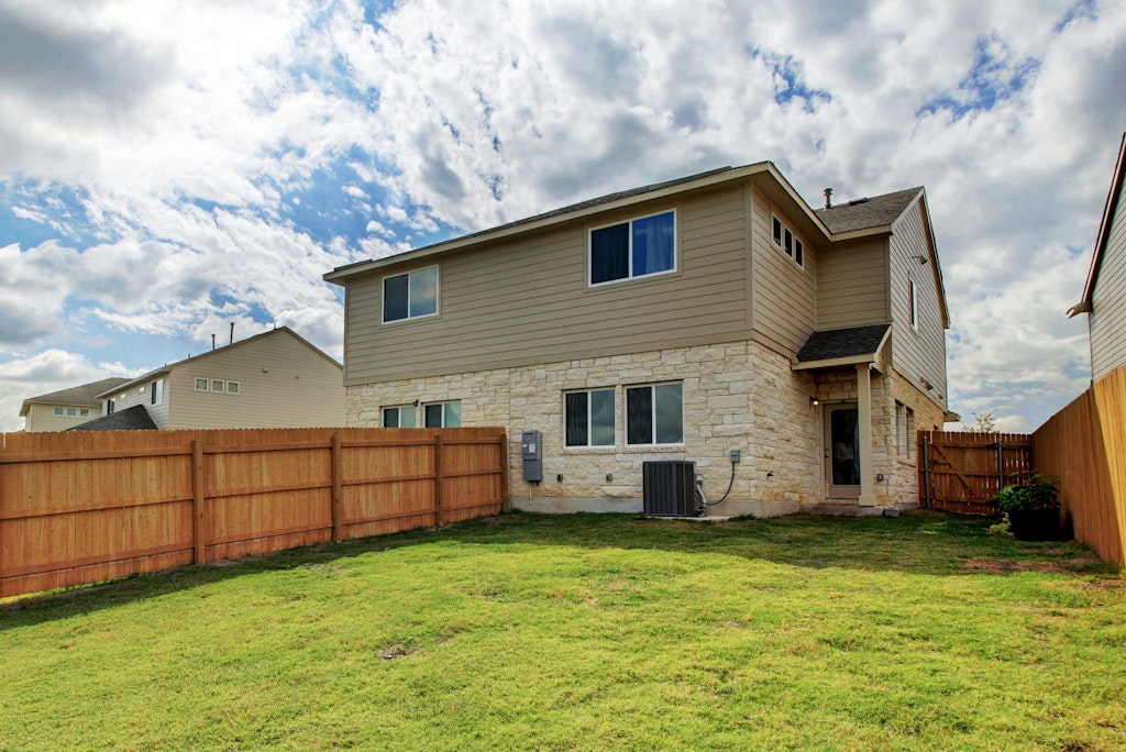 413 White Steppe Way Georgetown, TX 78626 - Photo 24 of 25 a front view of house with yard