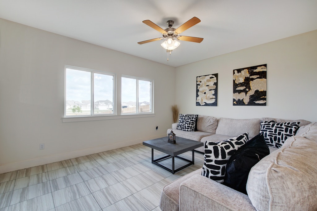 413 White Steppe Way Georgetown, TX 78626 - Photo 5 of 25 a living room with furniture and wooden floor